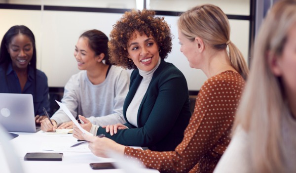 group-of-businesswomen-collaborating-in-creative-meeting-around-table-picture-id1279113943